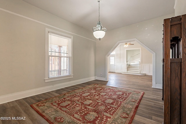 bonus room with dark wood-type flooring