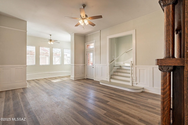 foyer with dark wood-type flooring and ceiling fan