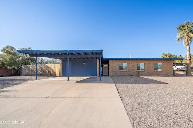 view of front of house with a carport