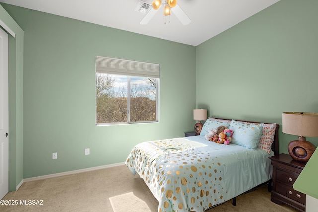 carpeted bedroom with ceiling fan