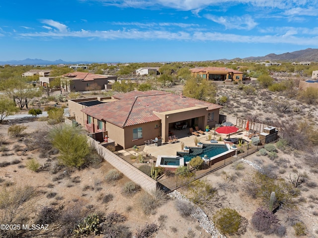 bird's eye view with a mountain view