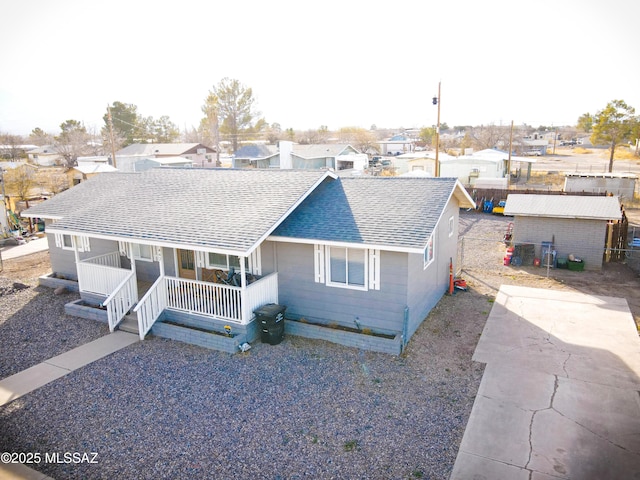 single story home featuring a porch