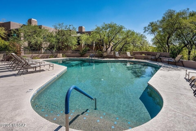 view of pool featuring a patio