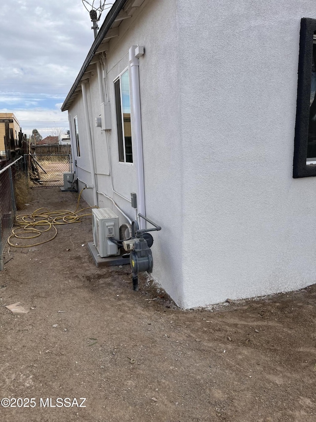 view of property exterior featuring ac unit