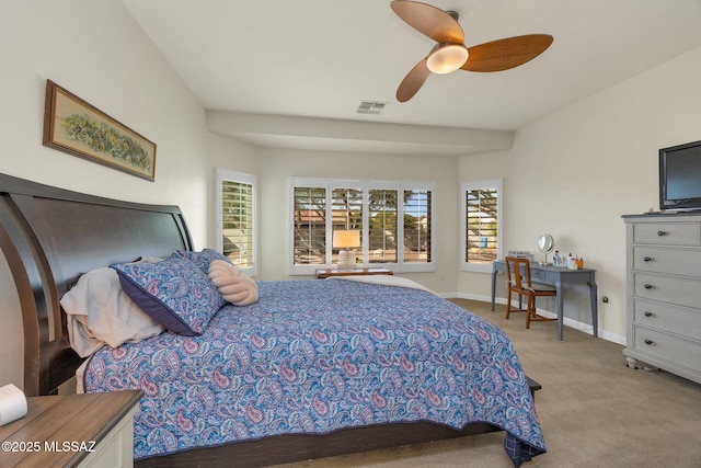 carpeted bedroom featuring ceiling fan