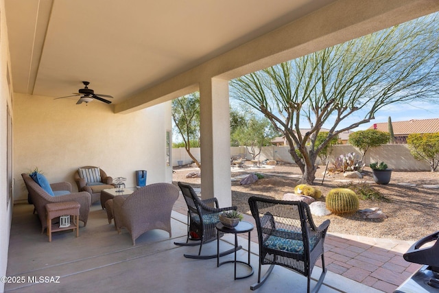 view of patio / terrace with an outdoor living space and ceiling fan