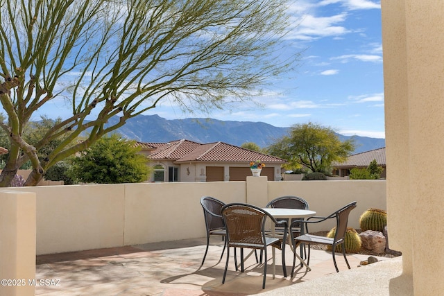 view of patio with a mountain view