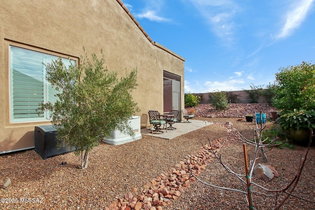 36239 S Cypress Dr, Saddlebrooke, AZ 85739 - view of yard featuring a patio, fence private yard, and central air condition unit