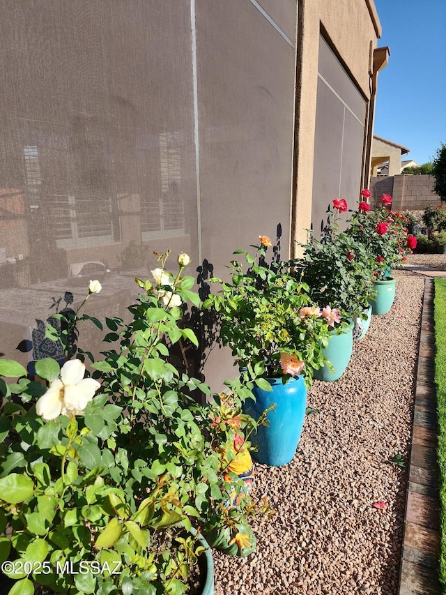 36239 S Cypress Dr, Saddlebrooke, AZ 85739 - exterior details with fence and stucco siding