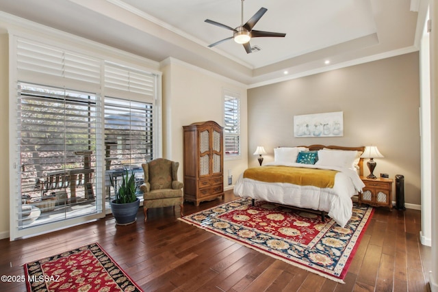 36239 S Cypress Dr, Saddlebrooke, AZ 85739 - bedroom with hardwood / wood-style flooring, baseboards, ornamental molding, and a raised ceiling