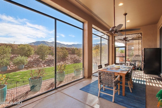 36239 S Cypress Dr, Saddlebrooke, AZ 85739 - sunroom / solarium with ceiling fan and a mountain view