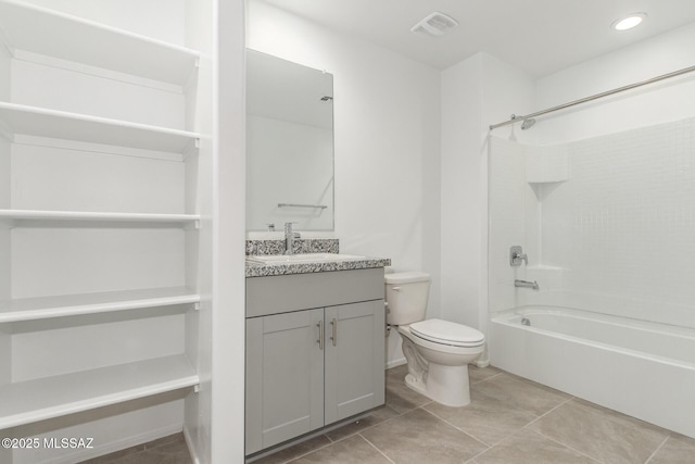 full bathroom with vanity, tile patterned floors, bathtub / shower combination, and toilet