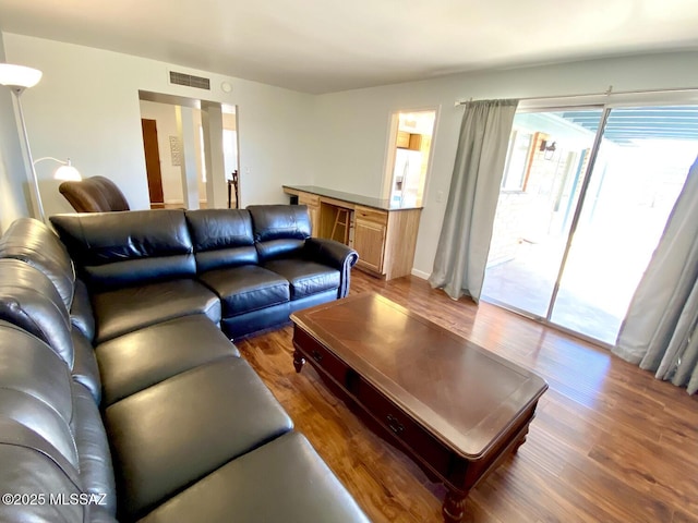 living room with dark wood-type flooring