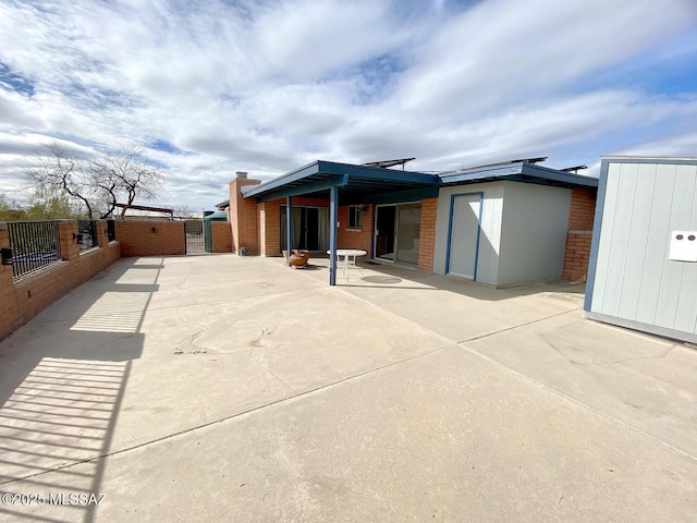 exterior space with a patio area