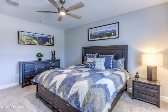 bedroom with light carpet and ceiling fan