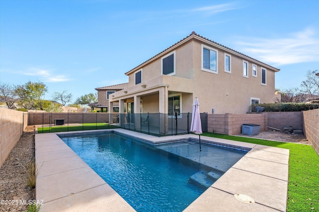 view of swimming pool with a fenced in pool, a fenced backyard, and a patio area