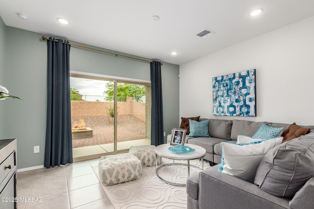 living room with light tile patterned flooring