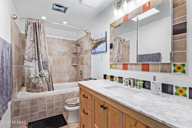 5485 N Blue Bonnet Rd, Tucson, AZ 85745 - full bath featuring tiled shower / bath, vanity, toilet, and recessed lighting