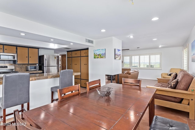 5485 N Blue Bonnet Rd, Tucson, AZ 85745 - dining room with recessed lighting