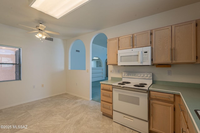 kitchen featuring ceiling fan, light brown cabinets, and white appliances