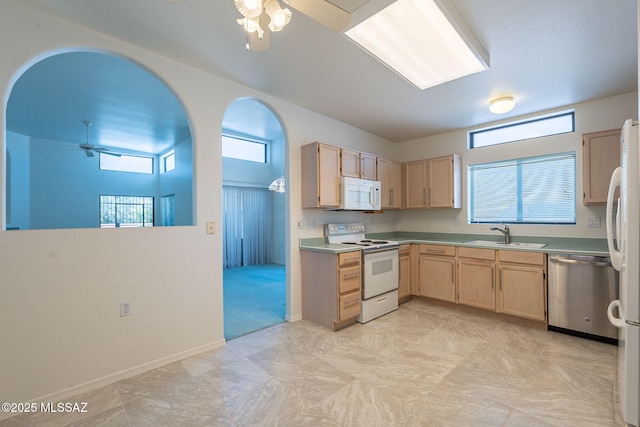 kitchen featuring ceiling fan, white appliances, sink, and light brown cabinets