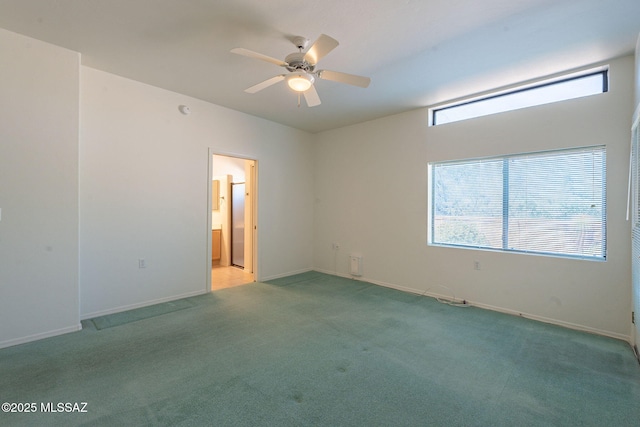 empty room with light colored carpet and ceiling fan