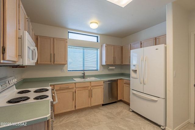 kitchen with sink, light brown cabinets, and white appliances