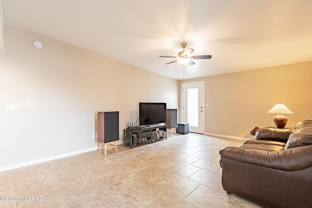 living room featuring ceiling fan