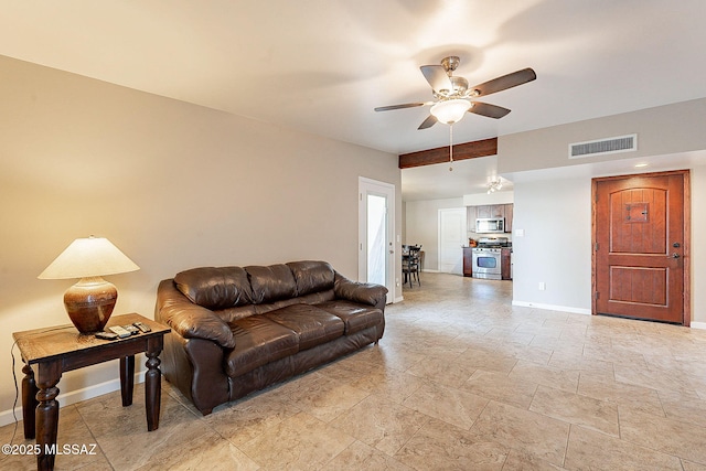 living room featuring ceiling fan