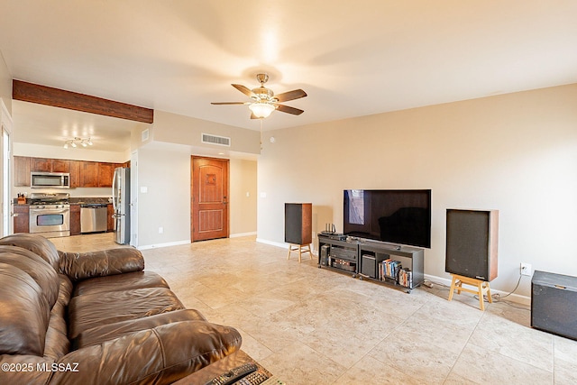 living room with ceiling fan