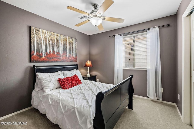 bedroom with visible vents, baseboards, a ceiling fan, and carpet floors