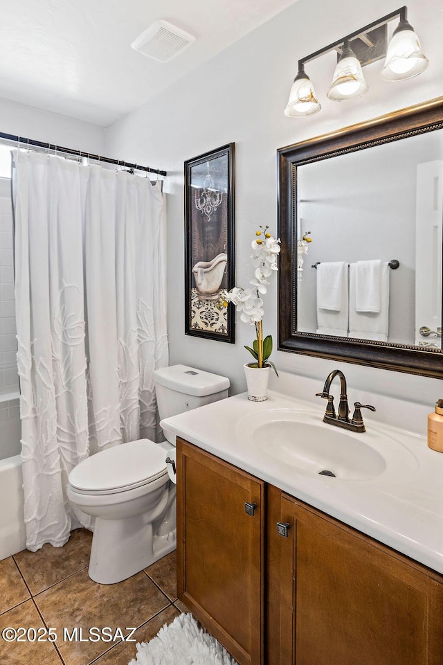 bathroom with toilet, tile patterned floors, shower / bath combo with shower curtain, and vanity