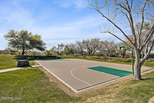 view of sport court with community basketball court and a lawn