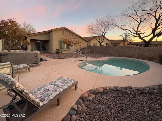 view of swimming pool with a fenced in pool, a fenced backyard, a patio, and a hot tub