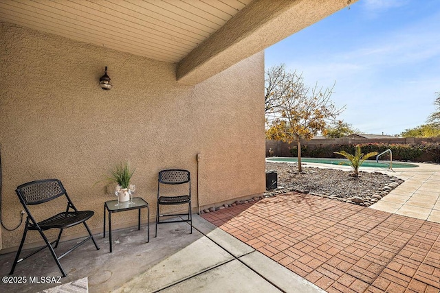 5473 W Bandtail Ct, Marana, AZ 85658 - view of patio with a fenced backyard