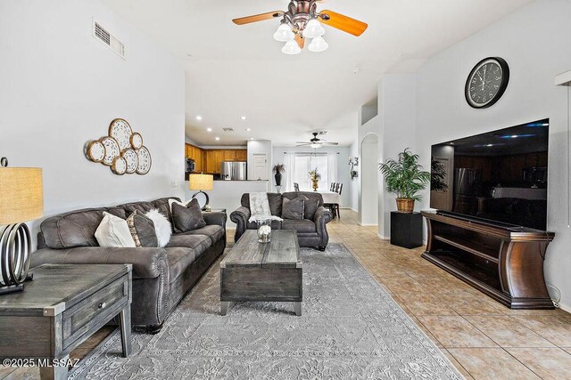 5473 W Bandtail Ct, Marana, AZ 85658 - living area featuring ceiling fan, light tile patterned floors, and recessed lighting
