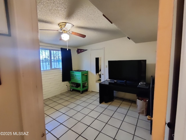 4016 E Fairmount St, Tucson, AZ 85712 - living area featuring a ceiling fan, light tile patterned floors, and a textured ceiling