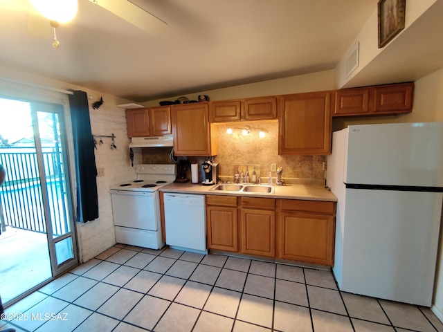 4016 E Fairmount St, Tucson, AZ 85712 - kitchen featuring light countertops, white appliances, under cabinet range hood, a sink, and light tile patterned floors