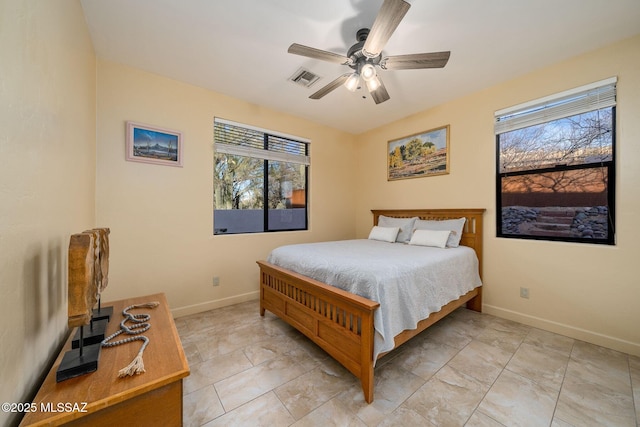 bedroom featuring ceiling fan