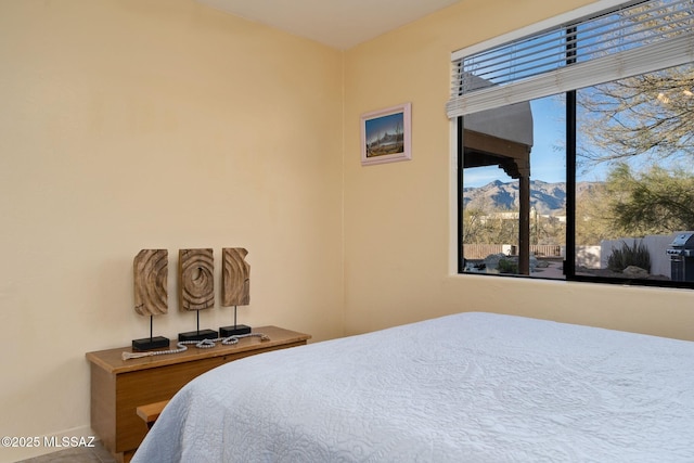 bedroom with a mountain view