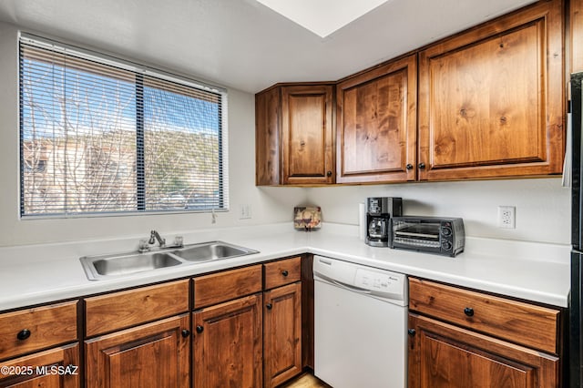 kitchen with dishwasher and sink