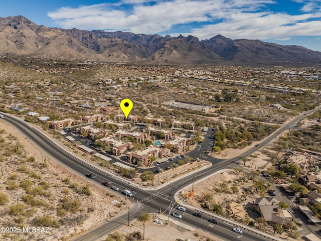 drone / aerial view featuring a mountain view