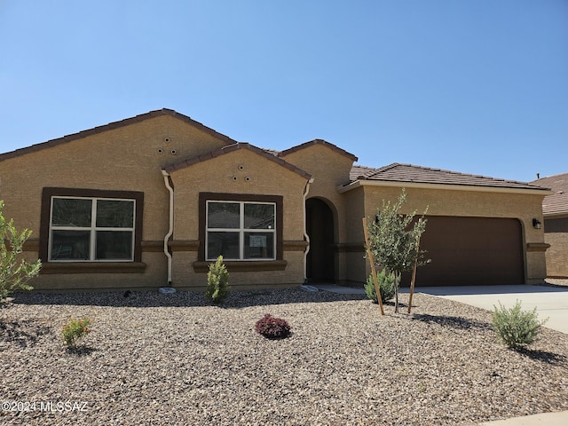 view of front of home with a garage