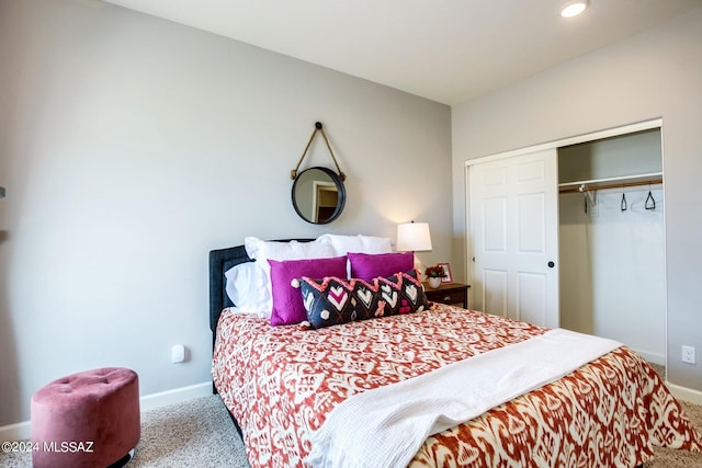 carpeted bedroom with a closet