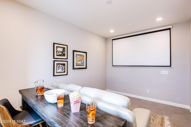 home theater room with tile patterned floors