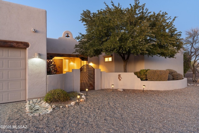 view of property exterior at dusk