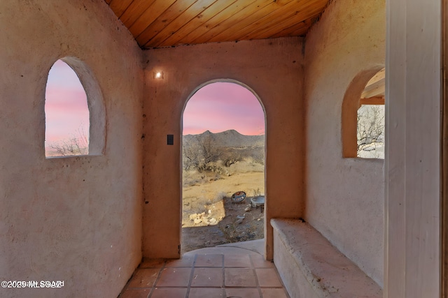 patio terrace at dusk with a mountain view