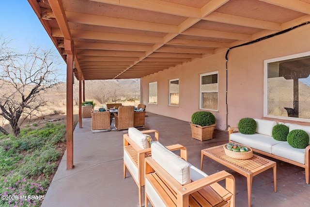 view of patio with an outdoor living space