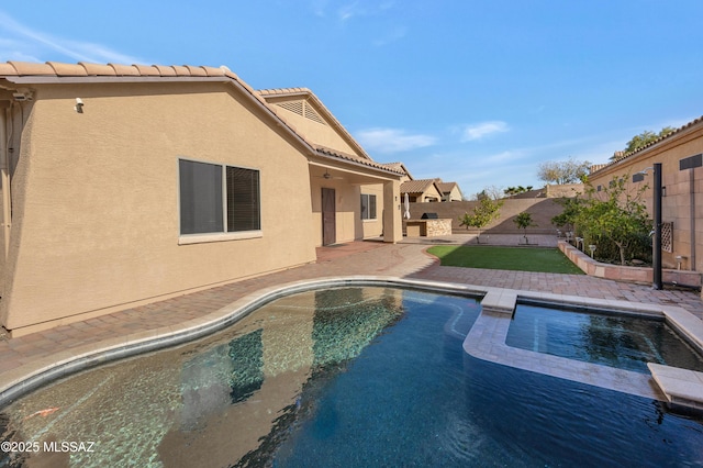 view of swimming pool with a patio