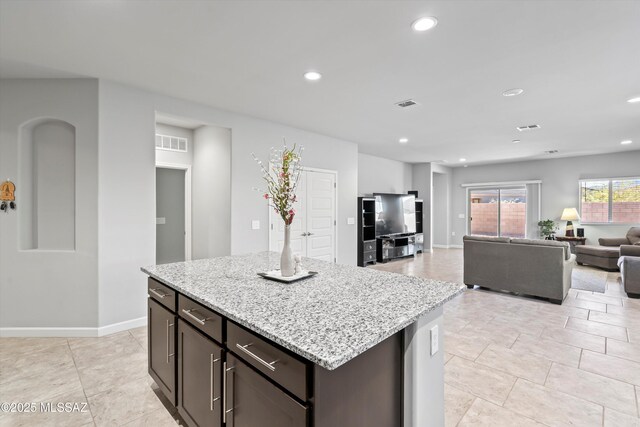 kitchen with visible vents, baseboards, recessed lighting, dark brown cabinets, and appliances with stainless steel finishes